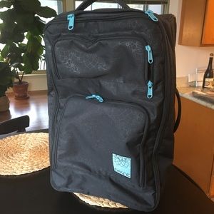 Dakine 2 wheel carry on suitcase
